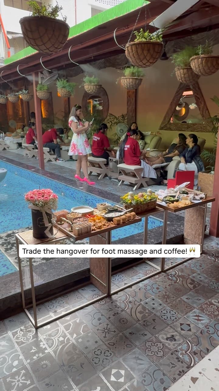 The poolside cafe spread — coffee, snacks and fresh flowers